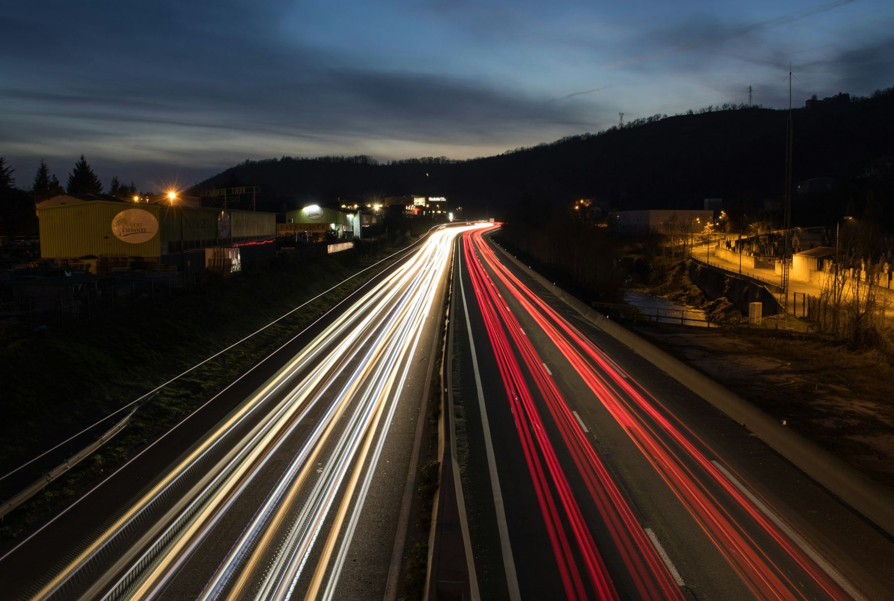 Light trails along a highway at night